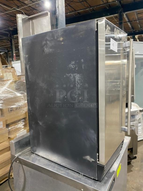 Asbury MIM50 stainless steel ice maker, electric-powered, Energy Star certified, with ice scooper, shown in good condition.