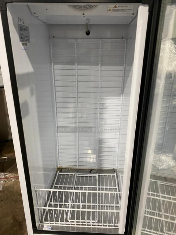 Turbo Air glass door ice merchandiser freezer, model TGIM23WN, with poly coated rack, excellent condition, 110-120V.