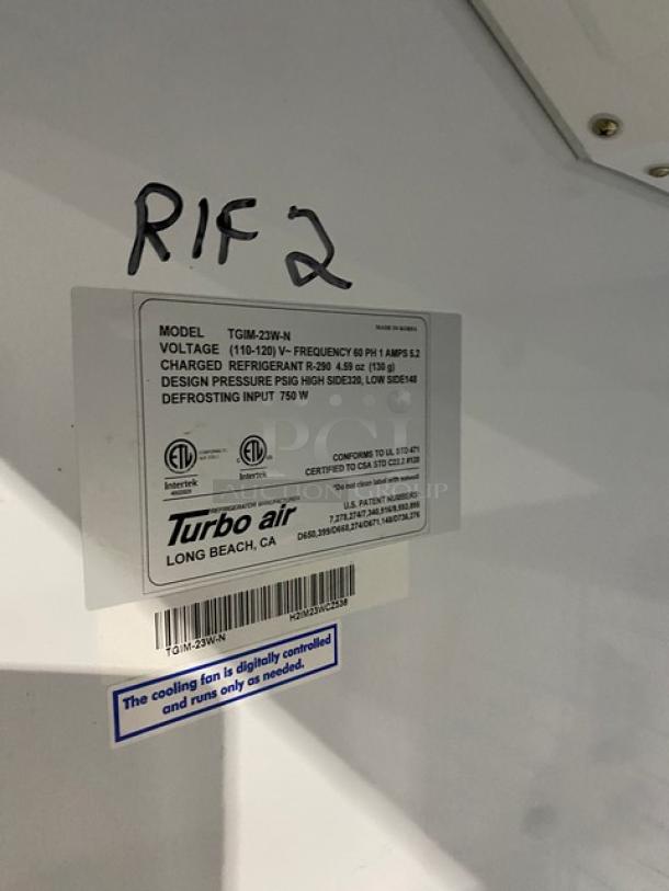 Turbo Air TGIM23WN label showing model, voltage, and certifications. Features include 110-120V, single-phase.
