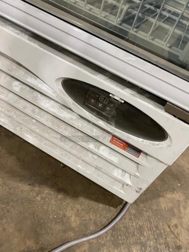 Turbo Air TGIM-23W-N glass door freezer, single door, white, poly-coated rack, model SN: H2IM23WCZ538, 110-120V.