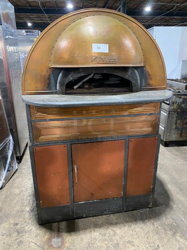 Izzo Forni commercial electric pizza oven, Napoletano style, bronze finish, includes pizza paddles, model Zeno logo visible.