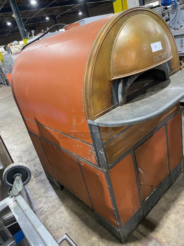 Izzo Forni commercial electric Napoletano pizza oven, orange exterior, metal trim, includes pizza paddles, good condition.