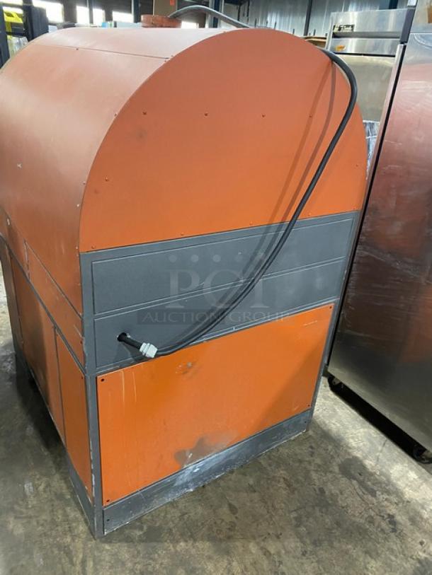 Izzo Forni commercial electric pizza oven, orange and gray, used condition, includes pizza paddles.