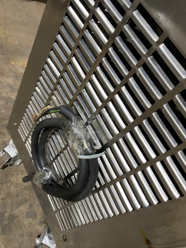 Electro Freeze 33S-237 soft serve machine, stainless steel, single flavor, 208-230V, 1 phase, on casters, coiled power cord.