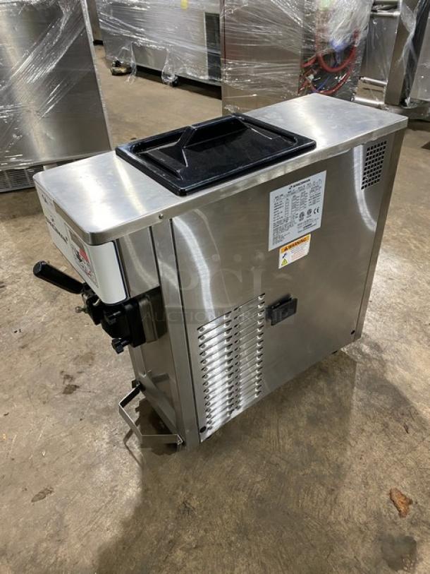 Spaceman 6210C stainless steel soft serve machine, countertop model with gravity-fed single flavor, electric 110V, on legs.