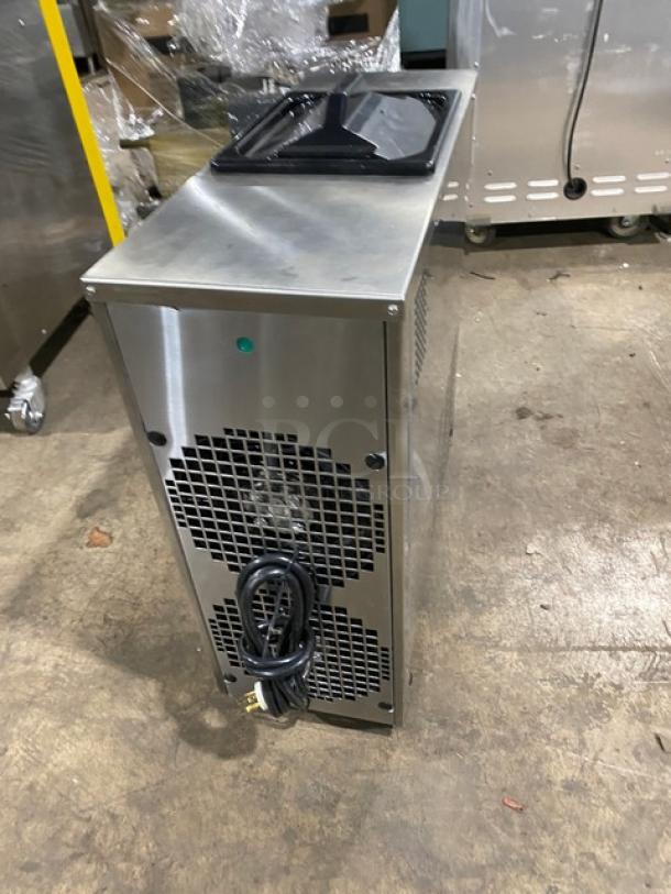 Spaceman 6210C stainless steel soft serve machine, commercial-grade, electric, single flavor, gravity-fed, 110V, on legs.