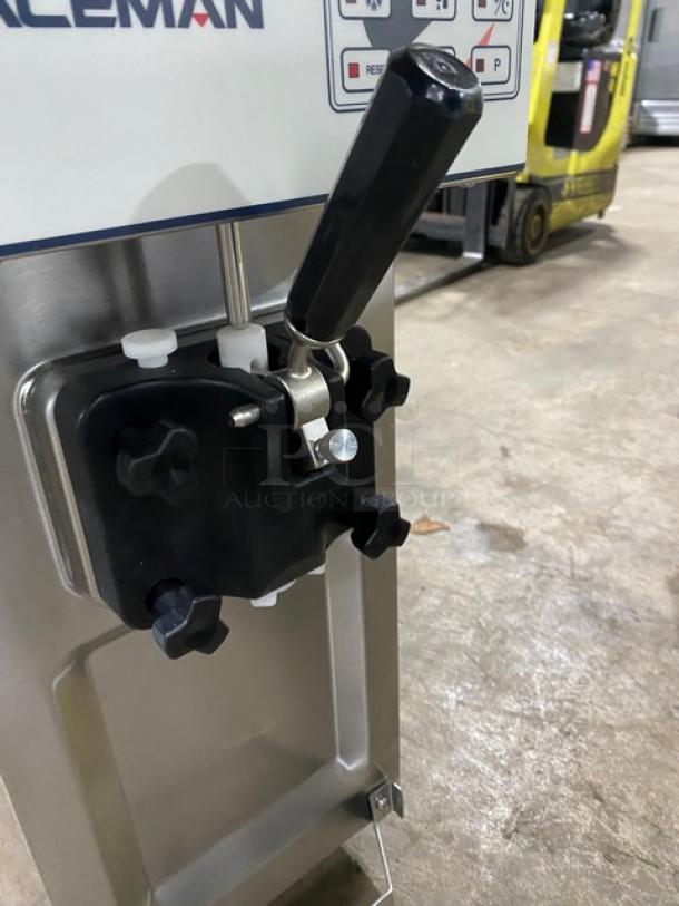 Spaceman 6210C soft serve machine, stainless steel, gravity-fed, single flavor, on legs, featuring control panel and handle.