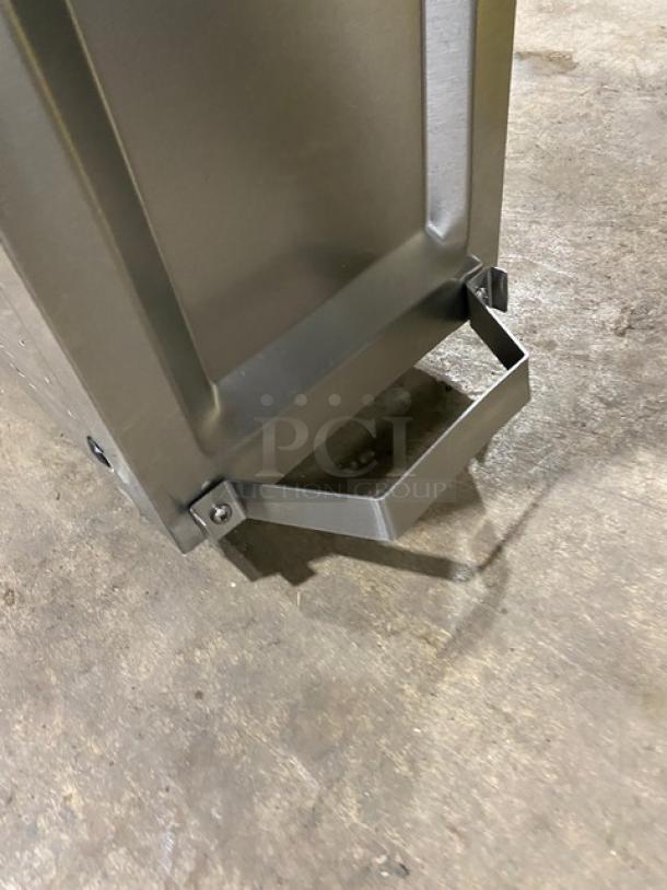 Spaceman 6210C stainless steel countertop soft serve machine base, showing durable metal legs for stability.