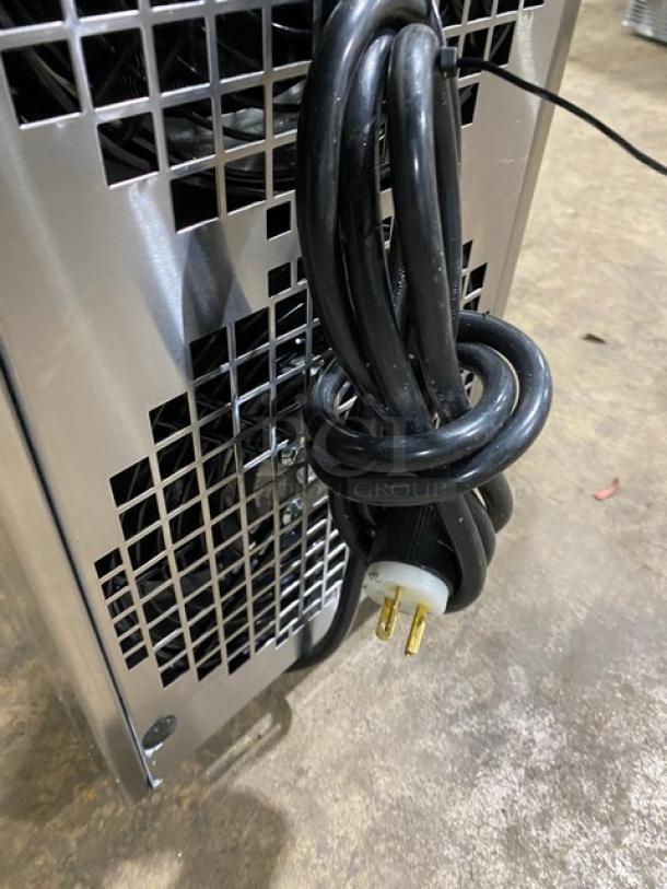 Spaceman 6210C stainless steel soft serve machine, gravity-fed, 110V, single flavor, on legs, power cord visible.