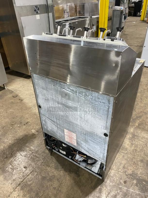 Silver King SKF2A refrigerated ice cream topping dispenser, stainless steel, single door, includes poly coated wire rack, 115V.