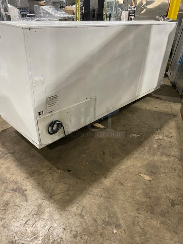 Hussmann LBN8 commercial white horizontal low-temperature display freezer, 4 glass sliding doors, model LBN-8, used condition.