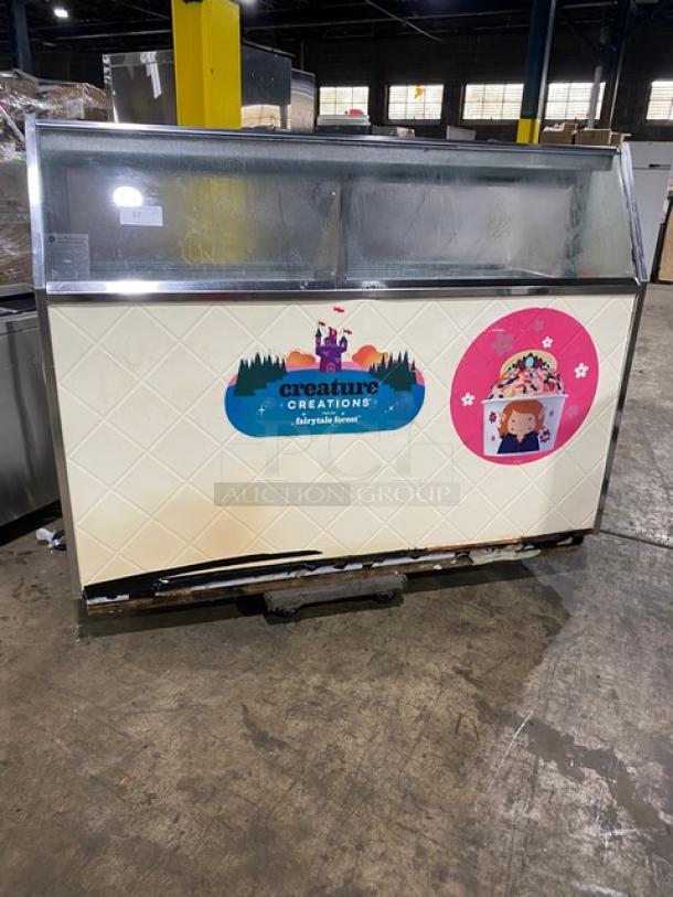 Beverage-Air 68" ice cream cabinet with sneeze guard, rear lift-open doors. Model BRT68P, fair condition, branded decals.