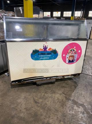 Beverage-Air 68" ice cream cabinet with sneeze guard, rear lift-open doors. Model BRT68P, fair condition, branded decals.