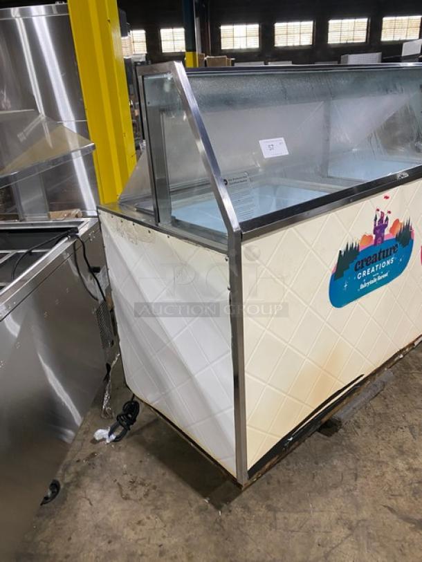 Beverage-Air BRT68P 68" ice cream cabinet, white, sneeze guard, rear lift doors, commercial use, "Creature Creations" decal.