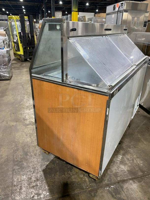 Beverage-Air commercial ice cream/frozen yogurt dipping cabinet, model BRT68P, with sneeze guard and rear double lift-open doors.