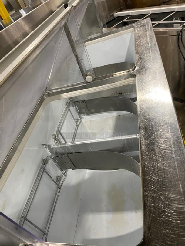 Beverage-Air 68" ice cream dipping cabinet, model BRT68P, with sneeze guard and rear double lift-open doors. Excellent condition.