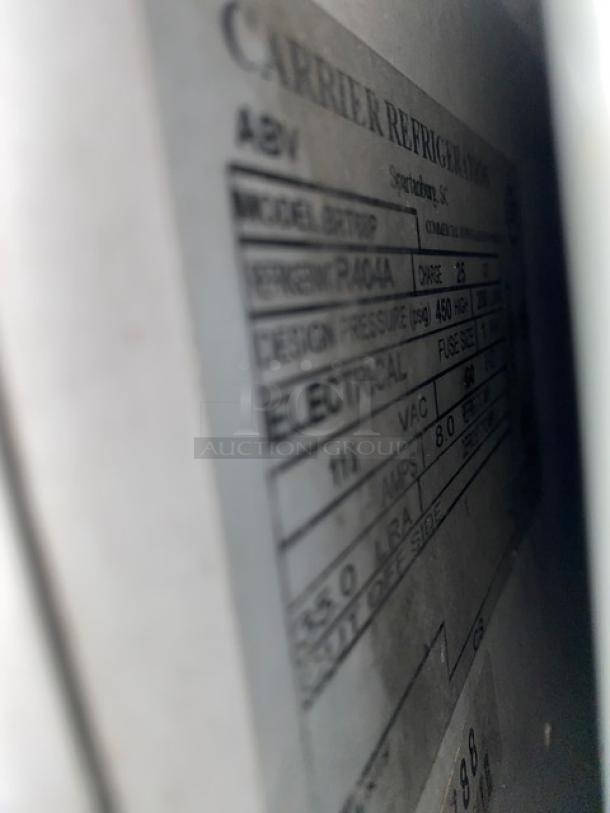 Beverage-Air BRT68P ice cream cabinet with sneeze guard, rear double lift doors, 68-inch width; carrier refrigeration label visible.