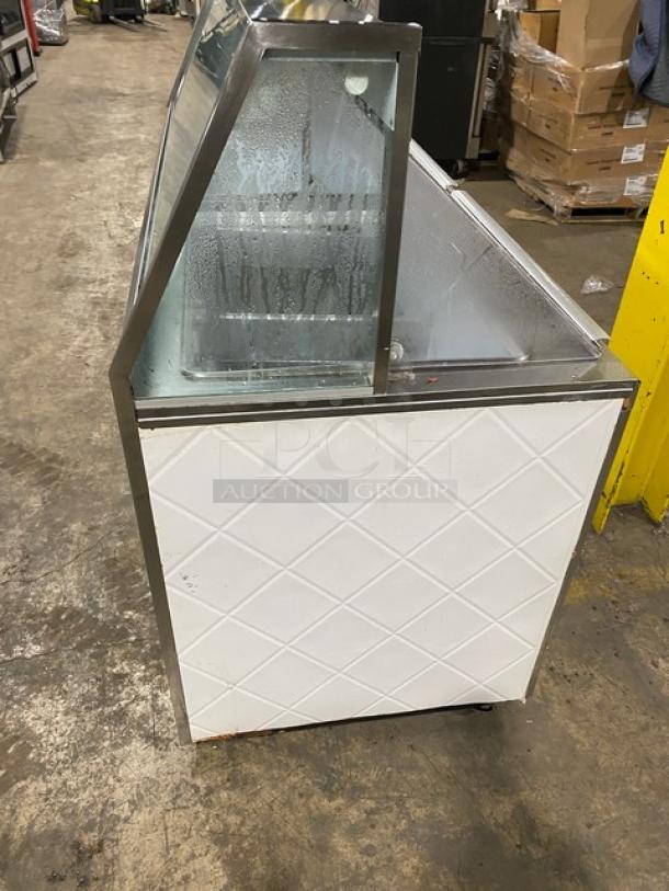 Beverage-Air BRT68P 68" ice cream dipping cabinet with sneeze guard, rear double lift-open doors, 115V, used condition.