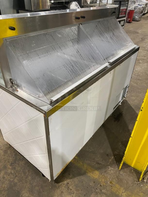 Beverage-Air BRT-68P 68" white ice cream dipping cabinet with sneeze guard and rear lift-open doors, 115V, used condition.