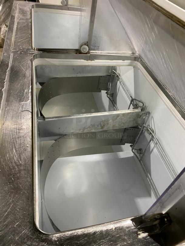 Beverage-Air Model BRT68P ice cream cabinet, 68" white, sneeze guard, double lift-open doors, 115V, shows interior and condition.