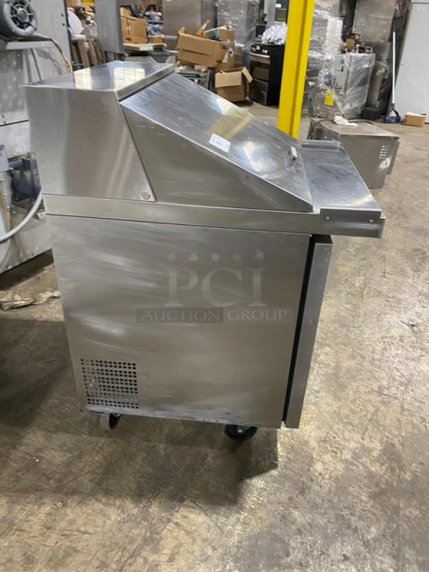 Atosa stainless steel refrigerated prep table, model MSF8305GR, with poly-coated rack, single door, on casters, 115V.