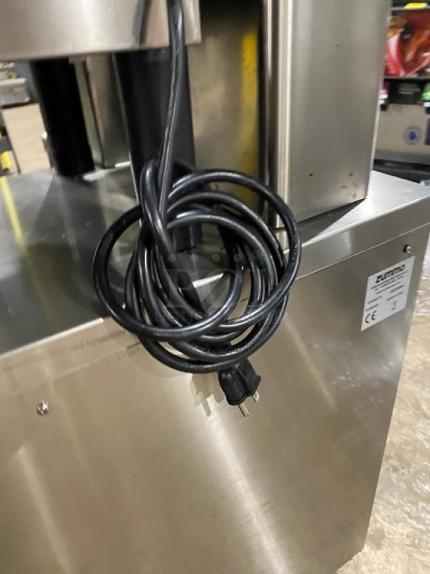 Zummo Nature Adapt Series Z40CN commercial juicer, stainless steel, electric 110-120V, with drip tray, on casters.