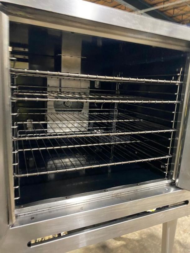 Imperial stainless steel commercial convection oven, natural gas, single stacked, wired oven rack, on casters, clean condition.