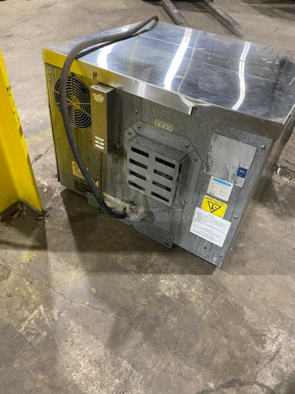 TurboChef NGC commercial stainless steel electric countertop oven with digital controls, ventless design, visible power cord.