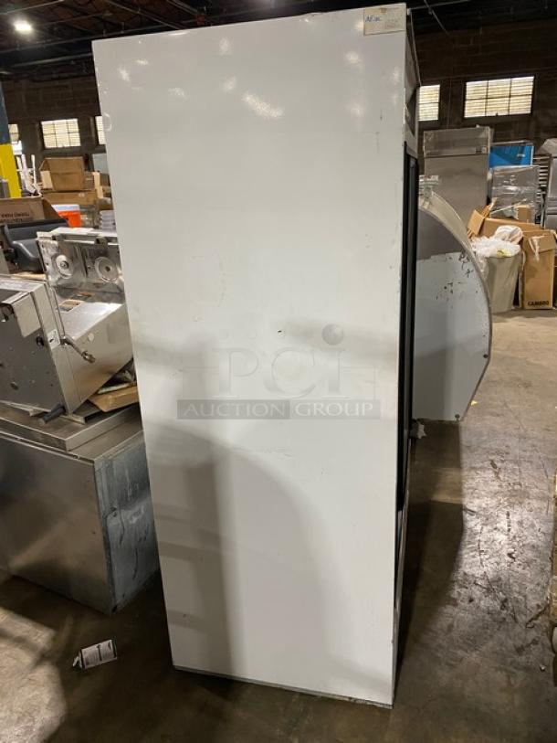 Beverage-Air MT45 commercial refrigerator, white, double glass sliding doors, poly coated wire rack, 115V, 1 phase, model number visible.