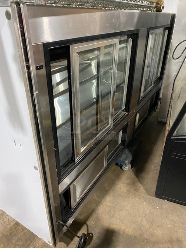 Leader Commercial Stainless Steel Curved Glass 96" Refrigerated Meat/Deli Merchandiser, Model NRHD96, with rear sliding doors and storage.