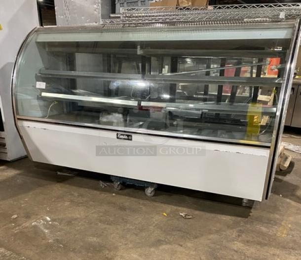 Leader commercial 96" stainless steel refrigerated display, model NRHD96. Features curved glass, multi-tier shelves, rear glass doors, and lower storage.