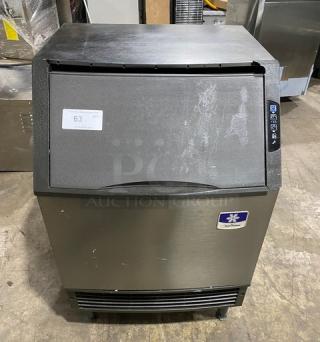 Manitowoc UD0140A stainless steel undercounter ice maker on legs, 115V, visible label, minor surface wear.
