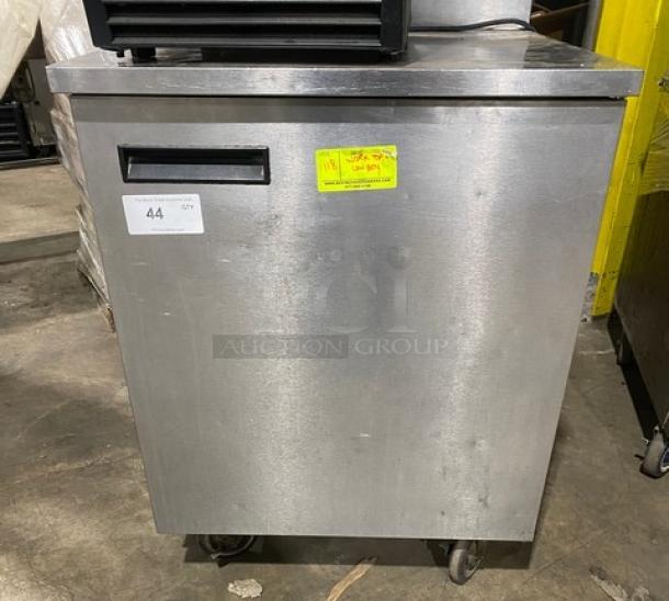 Delfield Enodis Series stainless steel single door worktop refrigerator, model 402, on casters, upturned backsplash, 115V.