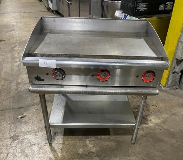 Star Commercial Stainless Steel Electric Flat Griddle with back and side splash, single undershelf, on legs.