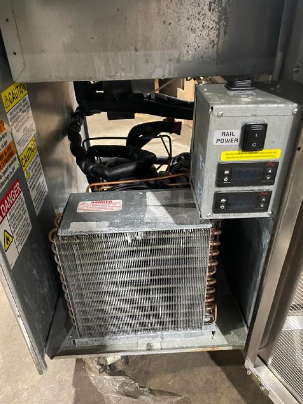 Delfield 18MC68P-EF refrigerated salad bar, stainless steel, 4 drawers, 5-well, enclosed undershelf, 115V, on casters.