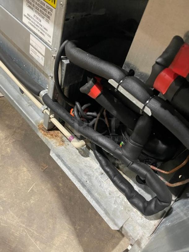 Delfield 18MC68P-EF stainless steel 4 drawer refrigerated salad bar, featuring an enclosed undershelf and casters. 115V, 1 phase.