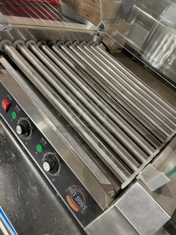 Festival Commercial Stainless Steel Electric Hot Dog Roller, Model ET-R2-11, with curved sneeze guard. 110V, excellent condition.