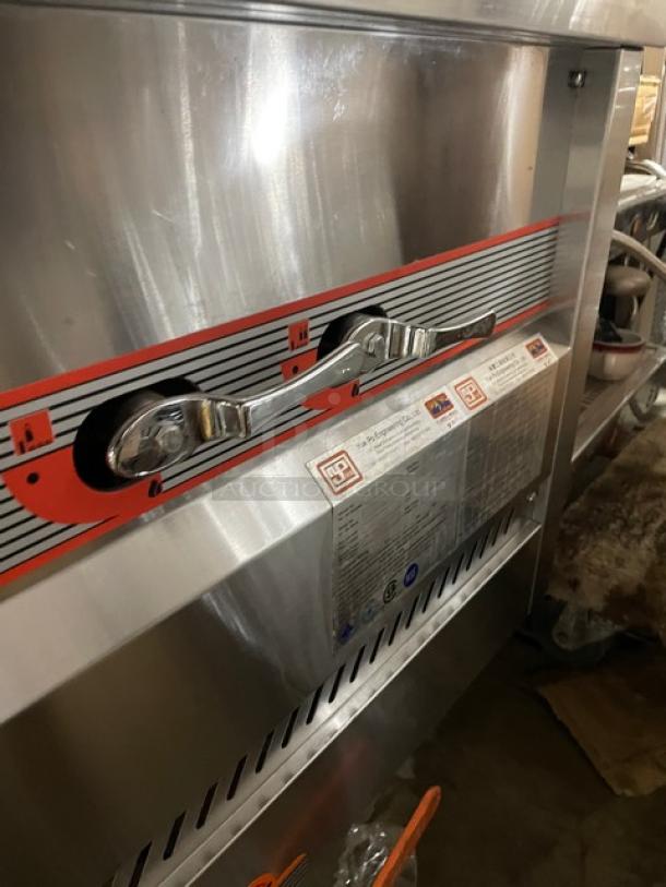 Flame-Mate ESC3NN stainless steel steam cabinet, 3 compartments, natural gas, SN: EC030ENFS00066660AB, 1 phase, on legs.