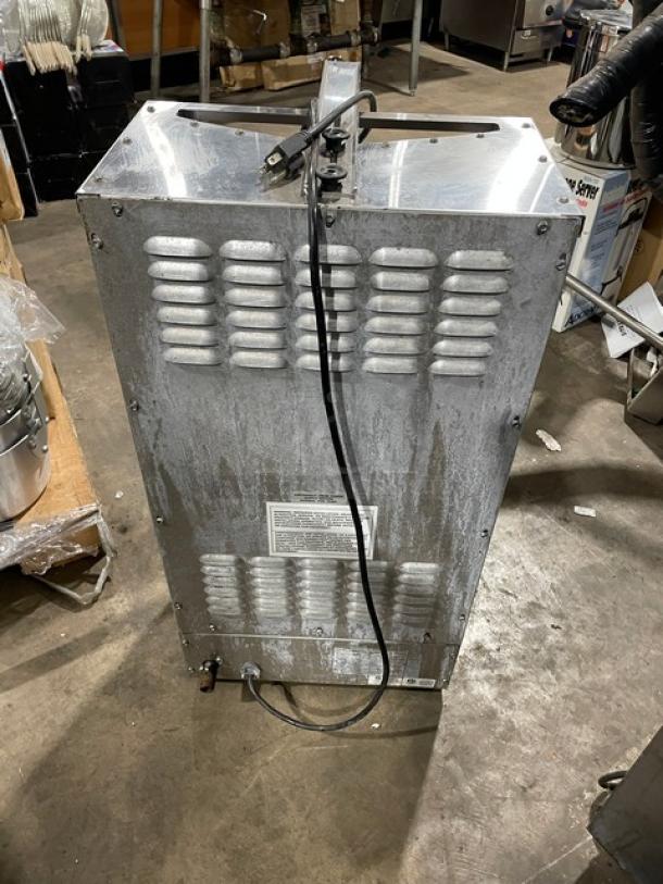 Star Max VBG30 stainless steel countertop vertical gyro broiler, natural gas powered, serial VBG300116A0007, on legs, 120V 1 Phase.