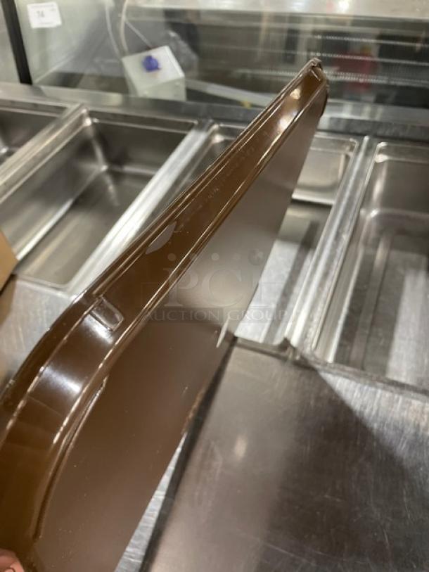 Cambro 14"x18" brown serving tray, model 1418FF167, new condition. Durable, ideal for commercial use.