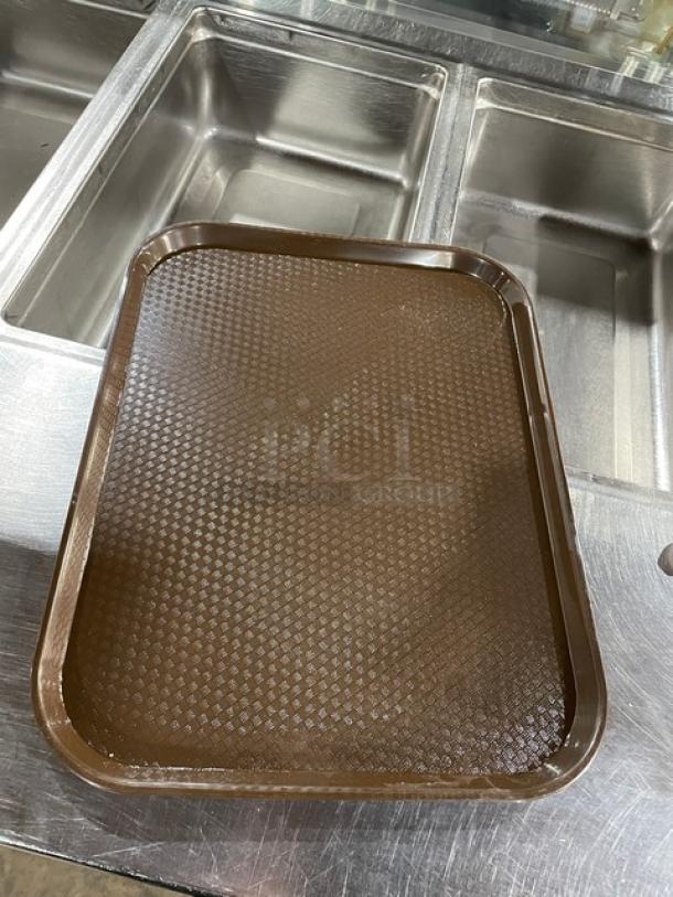 New Cambro 14"x18" brown fast food tray, model 1418FF167, textured surface, excellent condition.