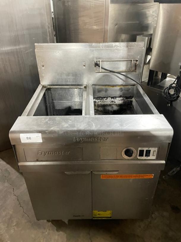 Fry Master FMP145ESC Stainless Steel 2-Bay Deep Fat Fryer, natural gas, with backsplash, basket hanger, on casters.