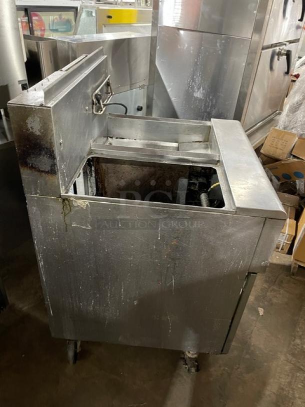 Fry Master stainless steel 2-bay deep fat fryer, model FMP145ESC, natural gas, with backsplash, basket hanger, on casters.