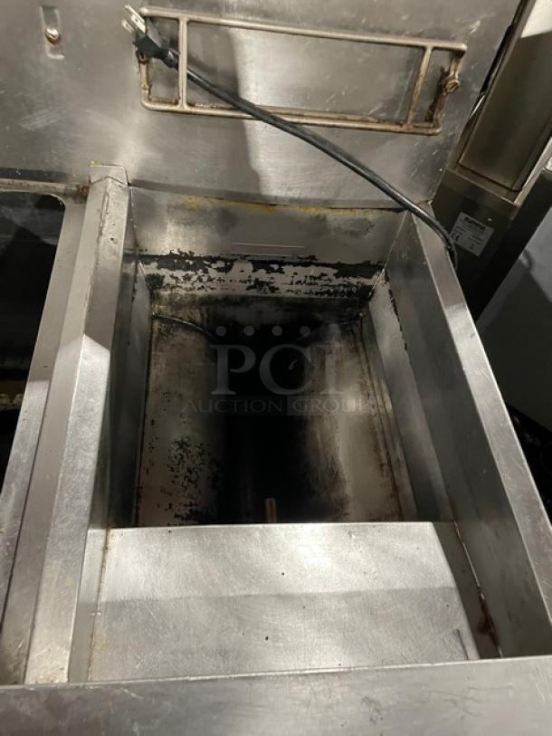 Fry Master FMP145ESC commercial 2-bay stainless steel deep fryer with back splash, basket hanger, on casters, natural gas.