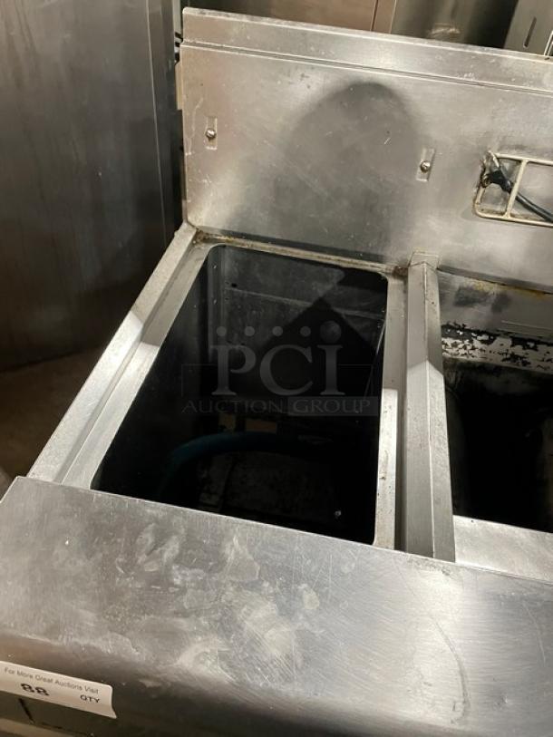 Fry Master FMP145ESC stainless steel gas deep fryer, two bays, includes backsplash and basket hanger, on casters.