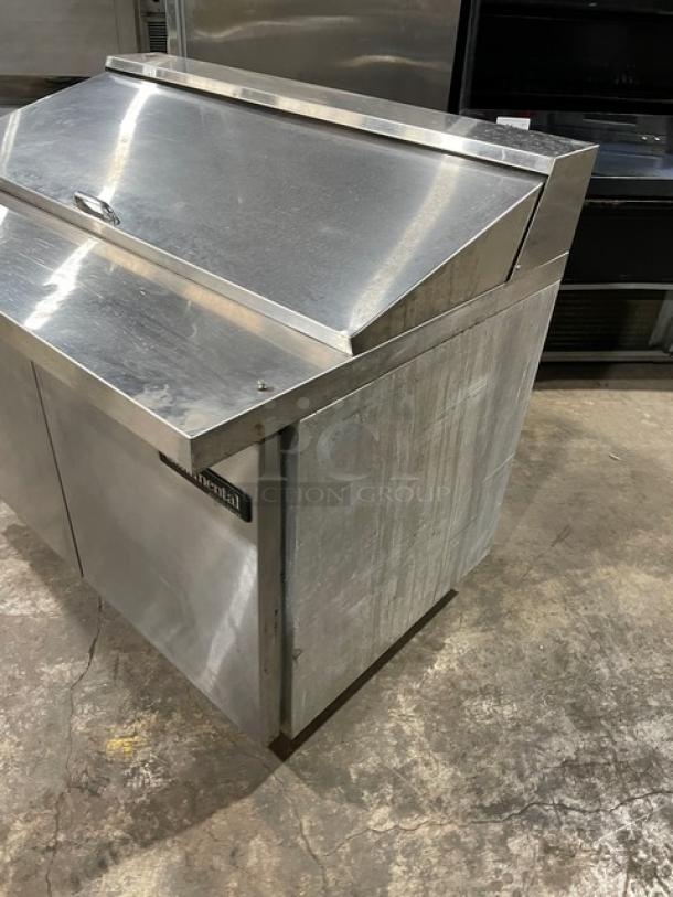 Stainless steel 2-door refrigerated prep table. Continental Model SW48-18M. Bain marie top, on casters. Used condition.