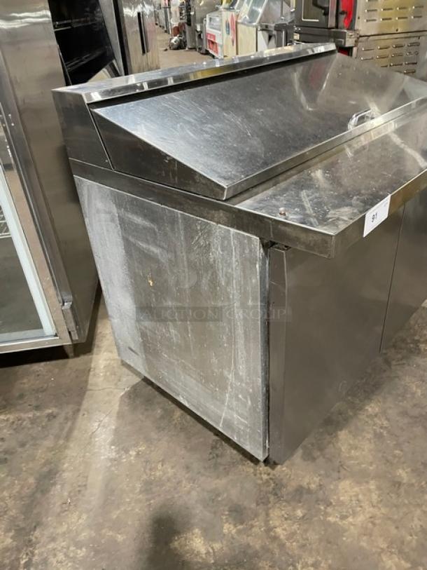 Continental Commercial Stainless Steel 2-Door Refrigerated Prep Table, Model SW48-18M, on casters, used condition, visible wear.