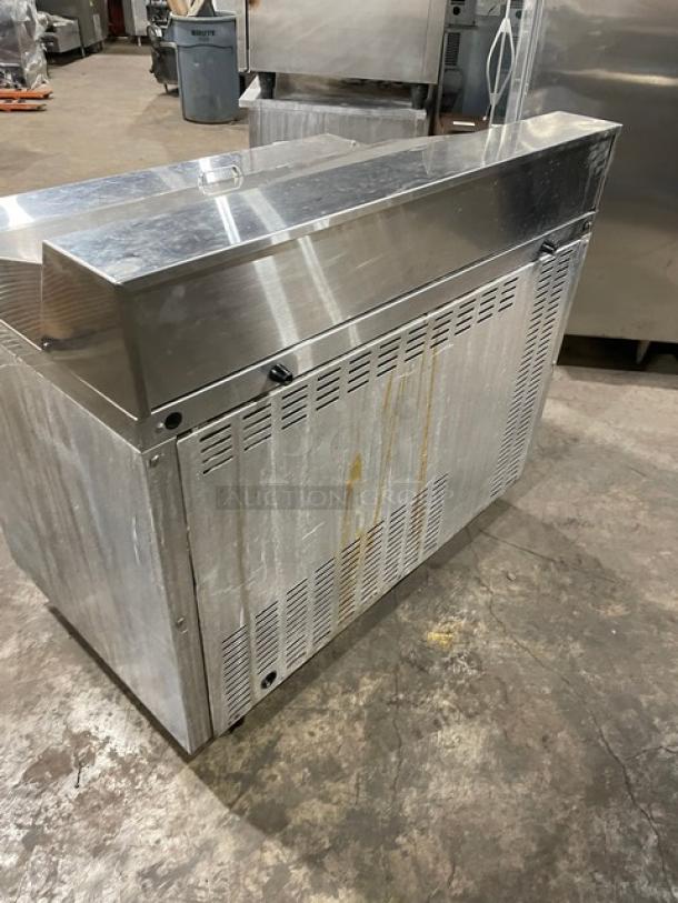 Continental SW48-18M stainless steel 2-door refrigerated prep table, Bain Marie style, on casters, commercial use.