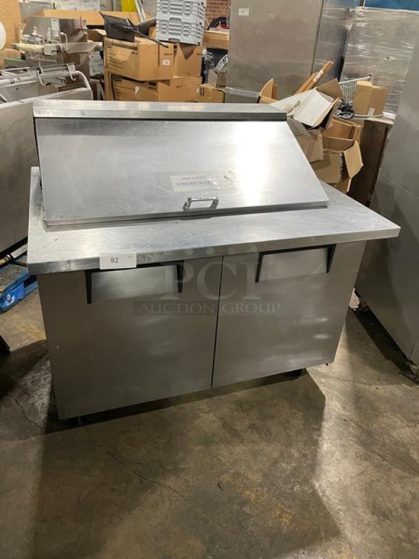 True Commercial Stainless Steel 2-Door Refrigerated Prep Table, Model TSSU-48-18M-B, with casters and poly-coated racks.