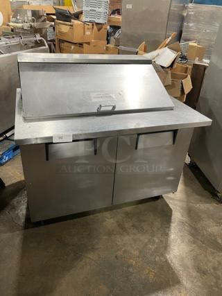 True Commercial Stainless Steel 2-Door Refrigerated Prep Table, Model TSSU-48-18M-B, with casters and poly-coated racks.